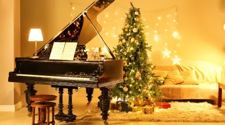 gold christmas tree with piano